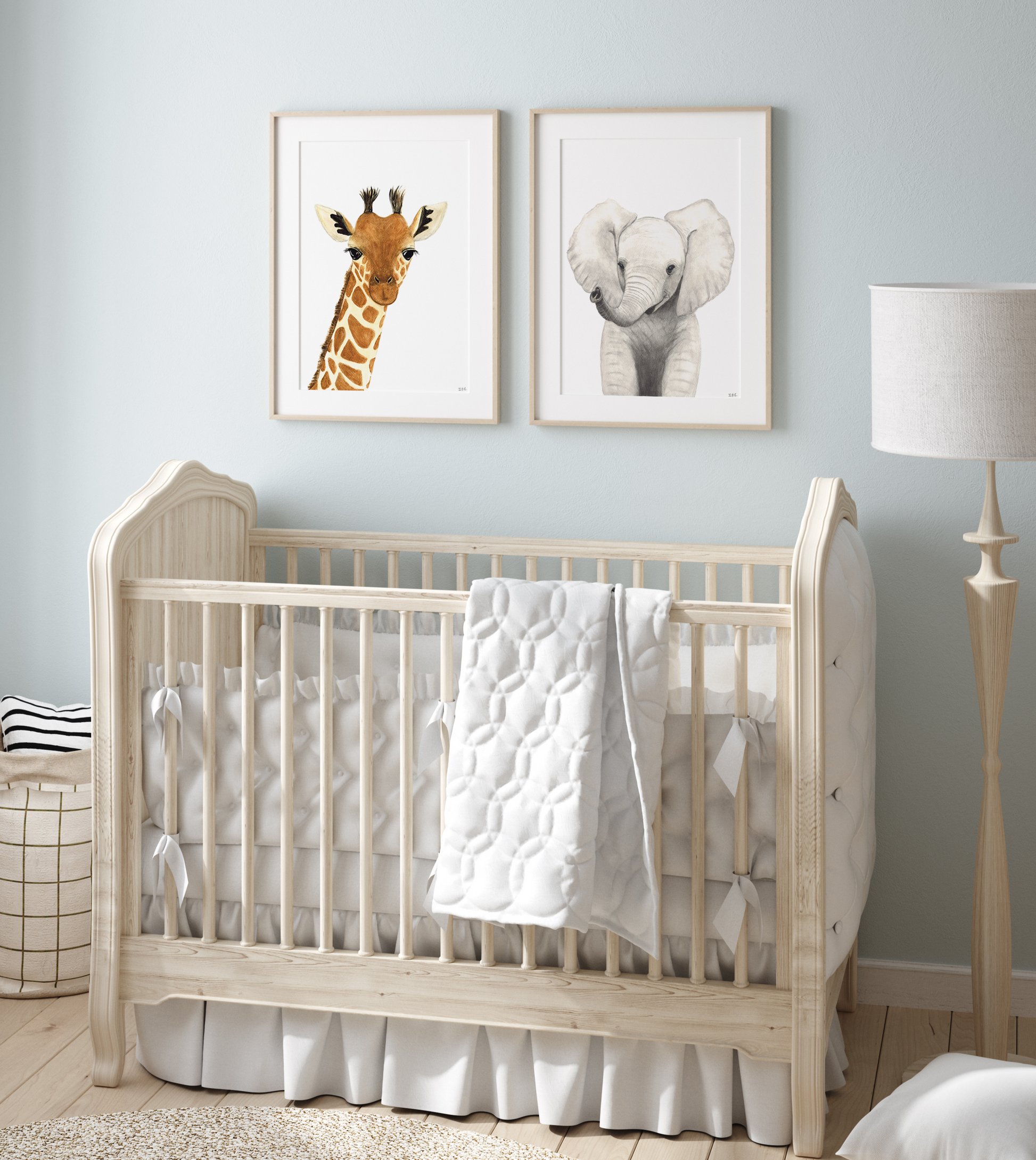 Set of 2 nursery animal prints in a babyroom: giraffe and elephant