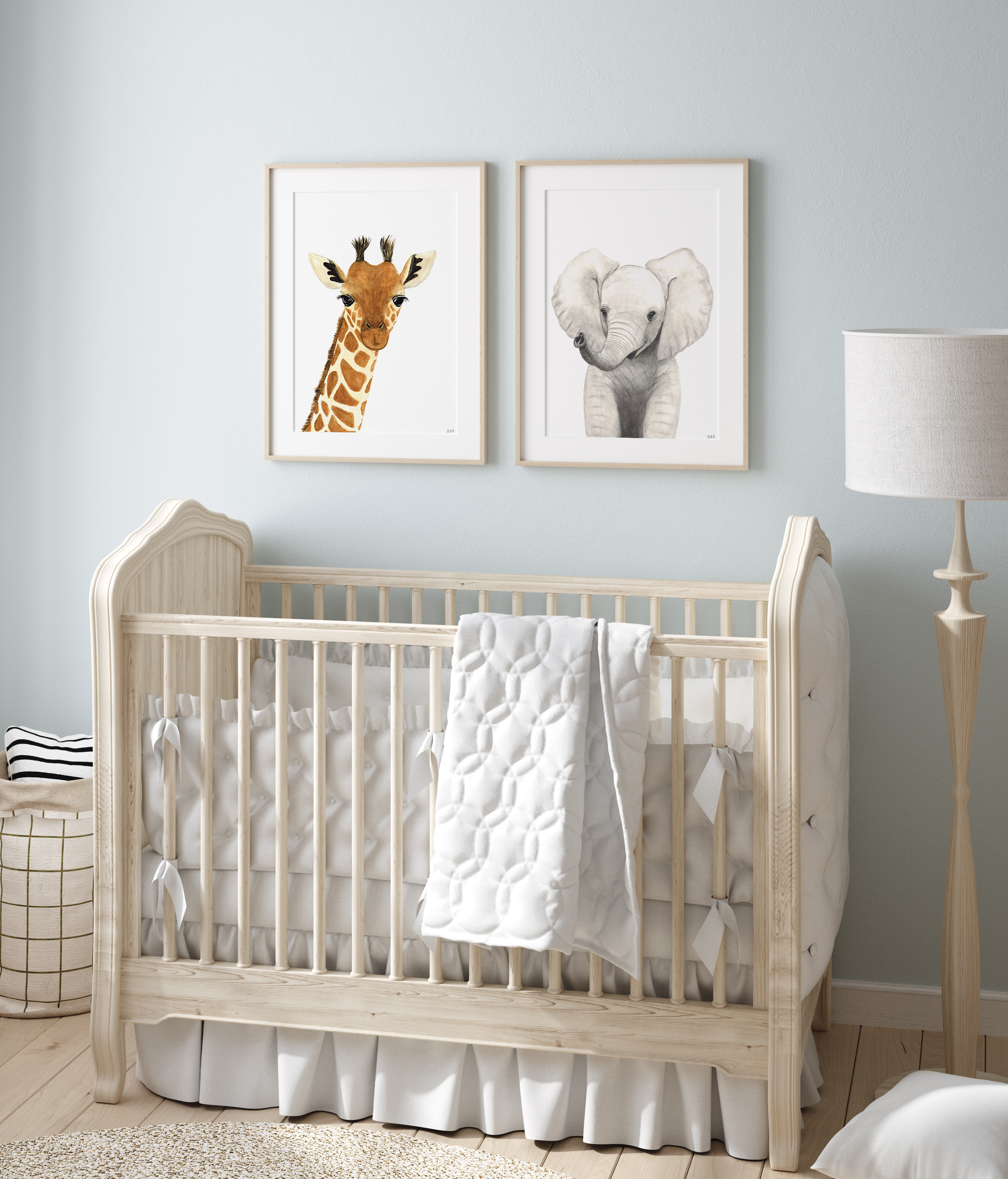 Set of 2 animal wall art prints in a nursery: giraffe and elephant