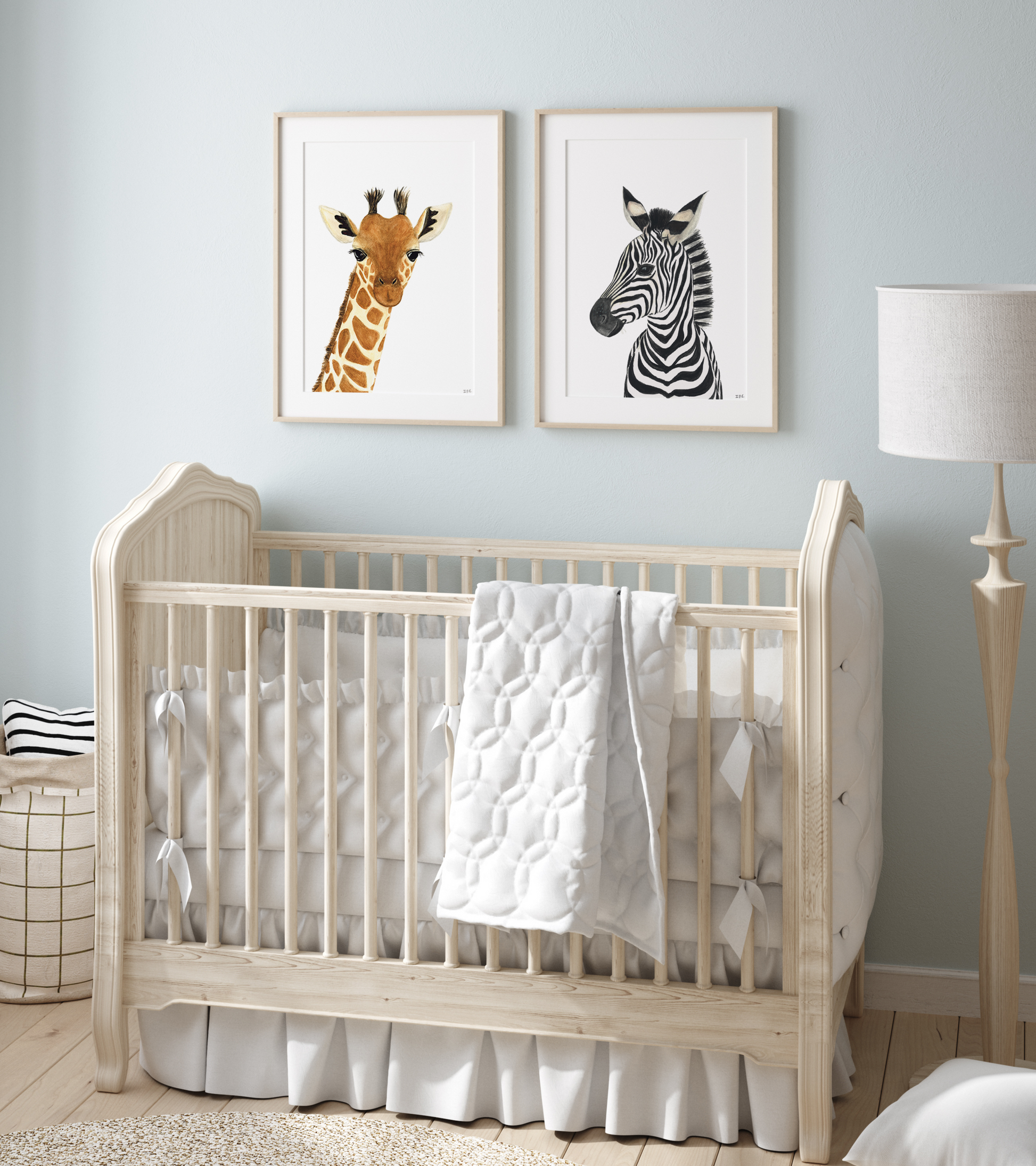 Set of 2 nursery safari animal prints above a baby crib: giraffe and sebra