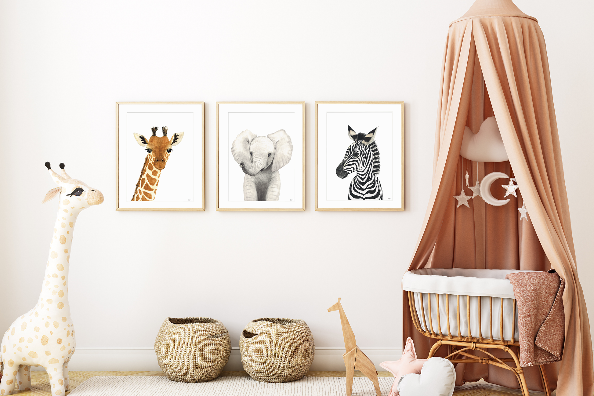 Set of 3 safari animal prints in a nursery: giraffe, elephant and zebra. 