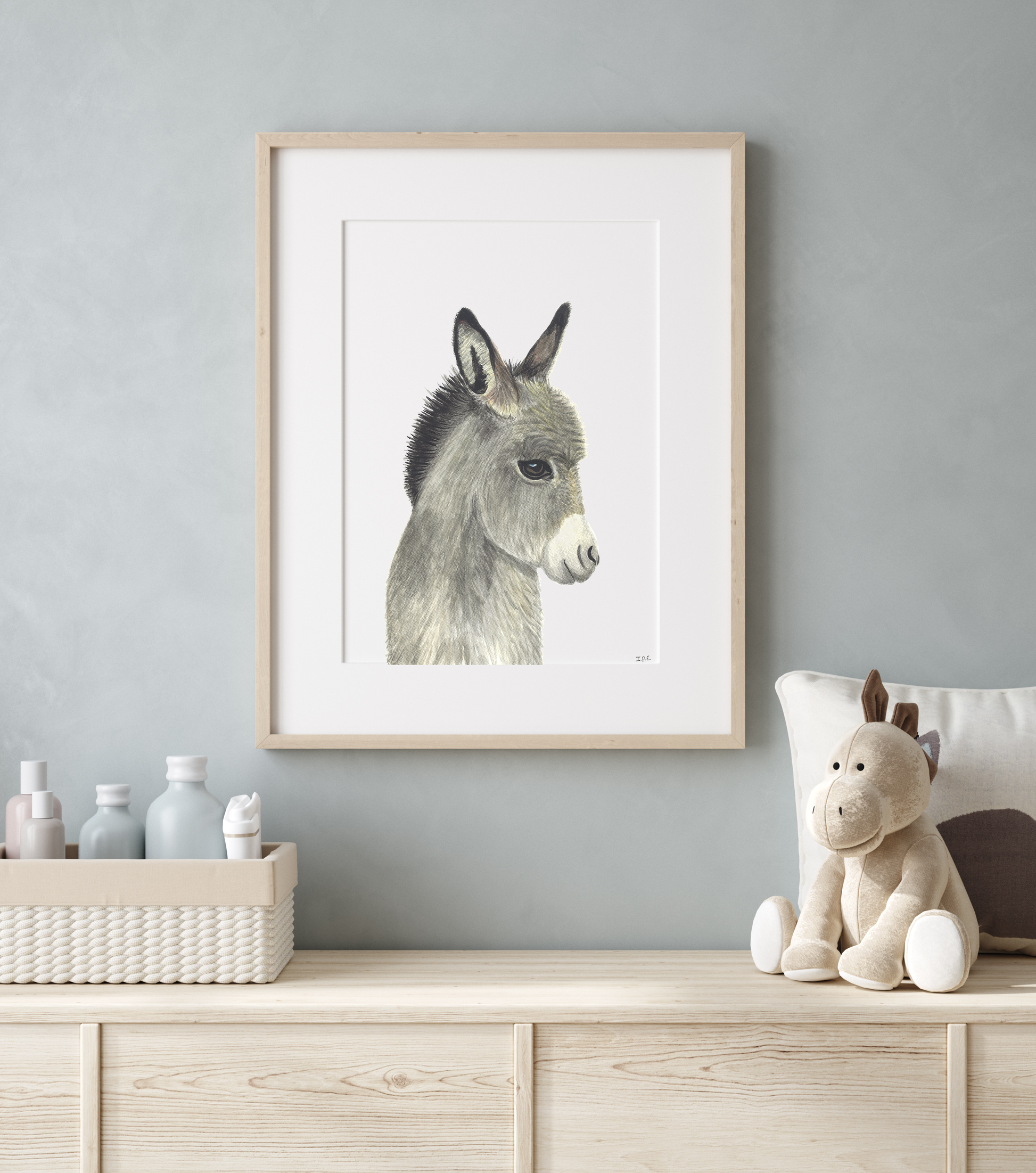 Framed donkey wall art in nursery