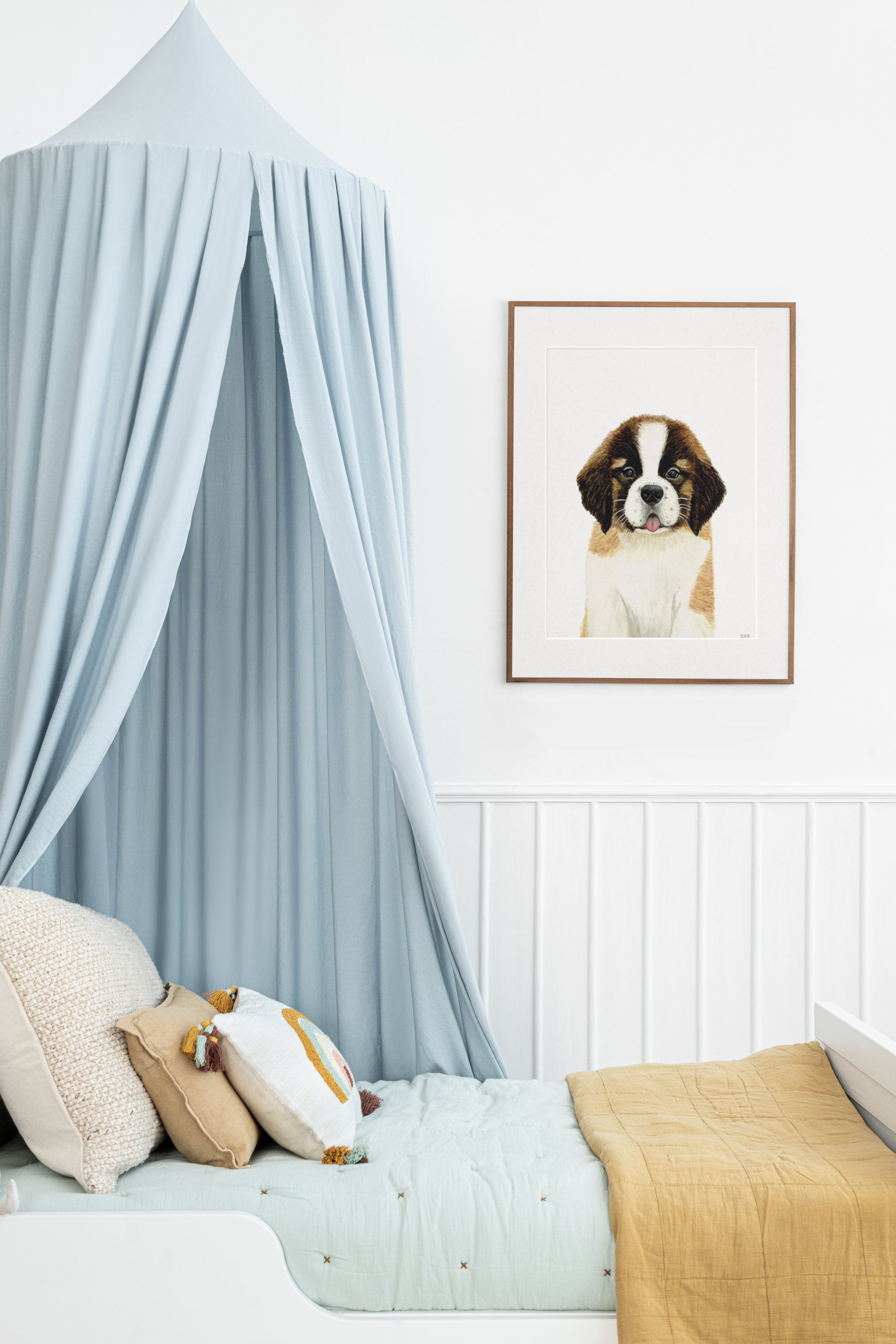 Saint Bernard dog framed and hung above childs bed