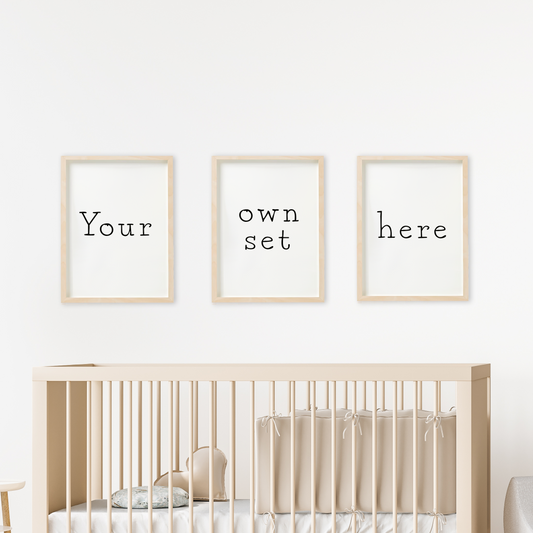 Empty frames with the text: ' your own set here' above a baby crib
