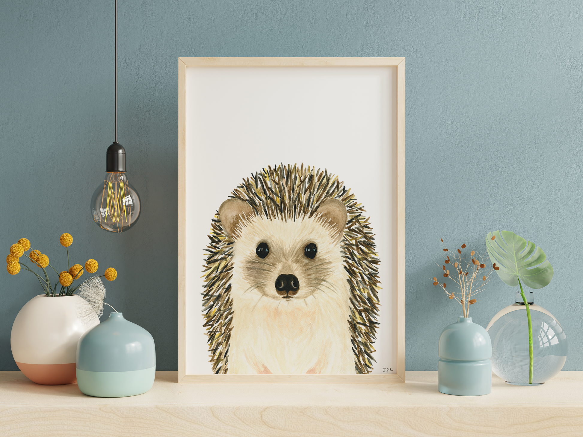 Hedgehog framed on a shelf with decoration