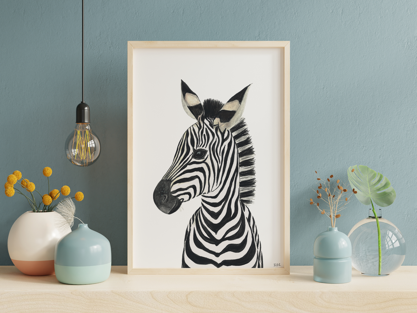 Framed zebra animal print on shelf with decor