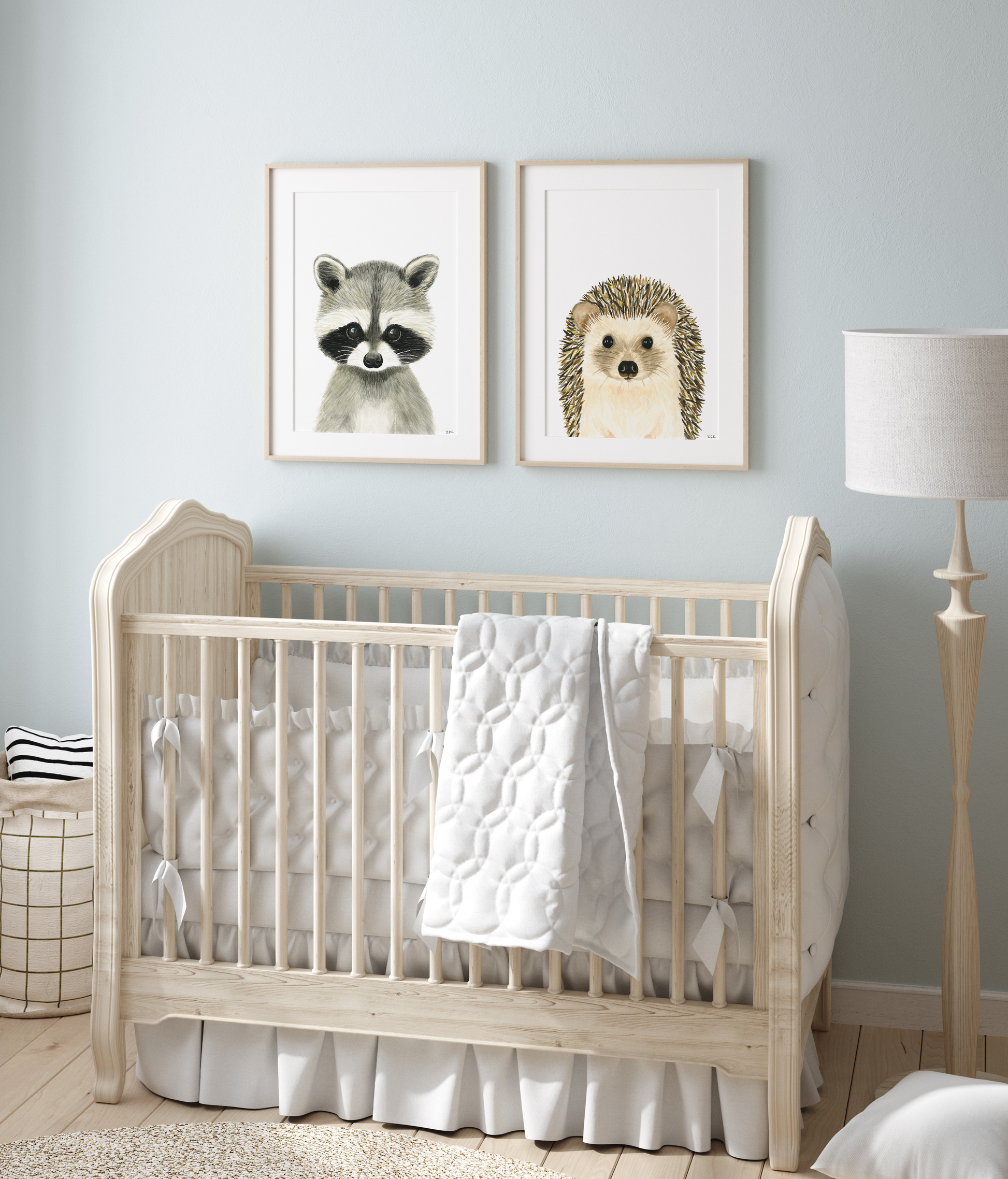 set of 2 nursery animal prints in a babyroom: racoon and hedgehog