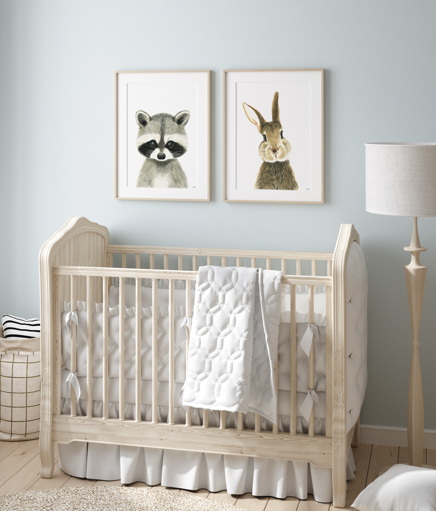 Set of 2 nursery prints in babyroom above baby crib: racoon and rabbit