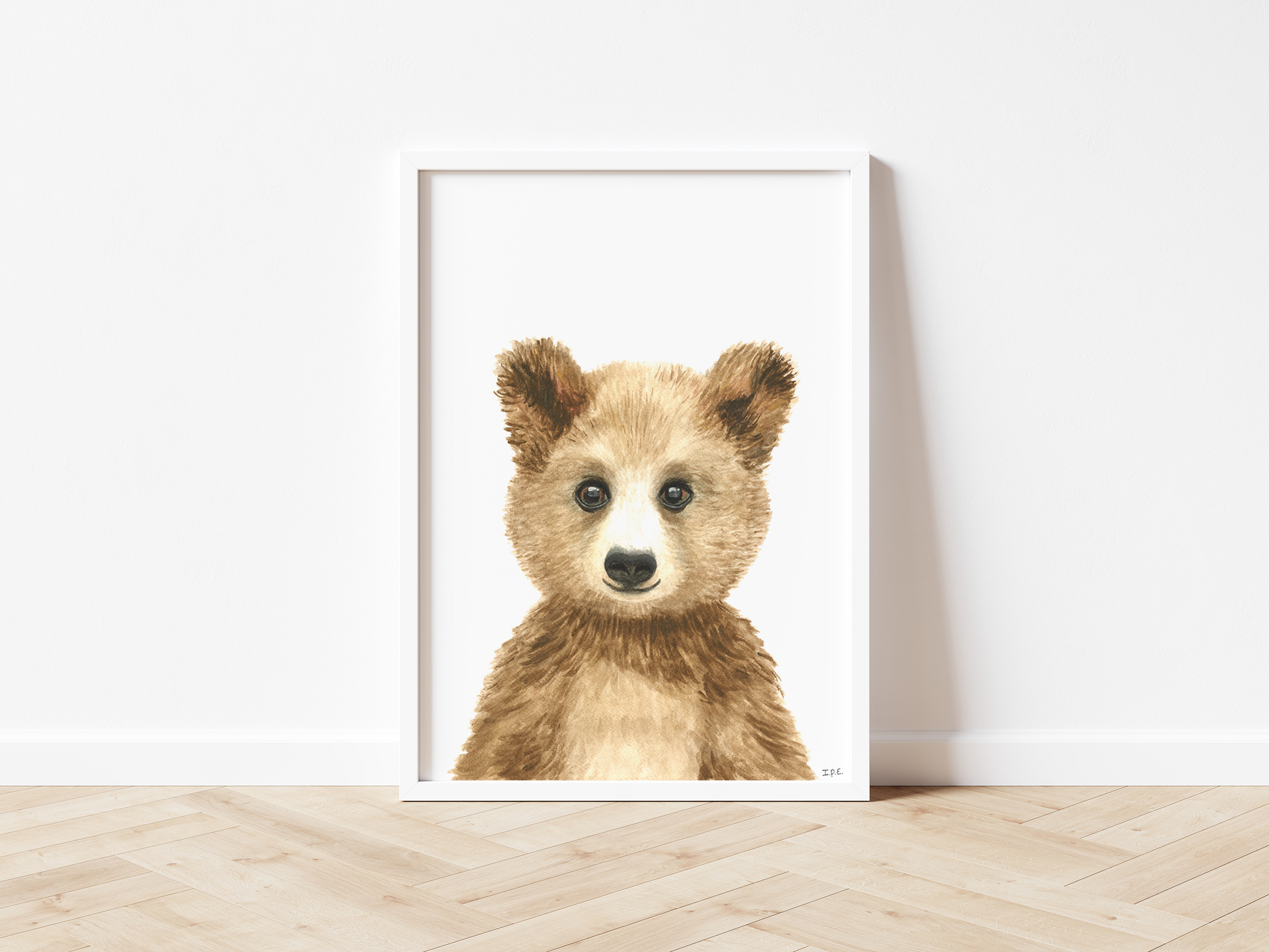 Framed bear print on wooden floor