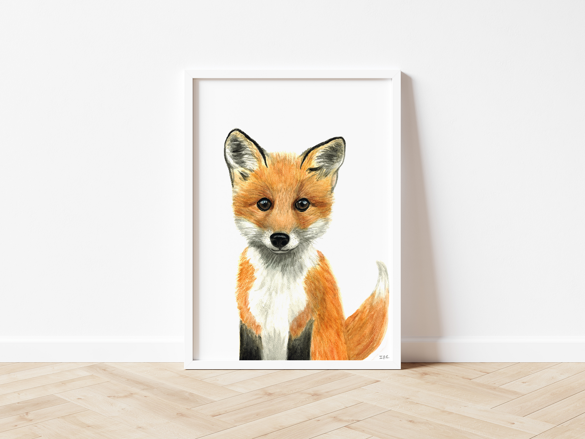Framed wall art print of a fox, on wooden floor